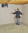 Taunton basement insulation covered by EverLast™ wall paneling, with SilverGlo™ insulation underneath